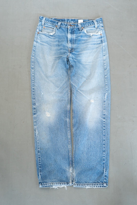 1990S DISTRESSED ORANGE TAB LEVI'S 505 DENIM PANTS